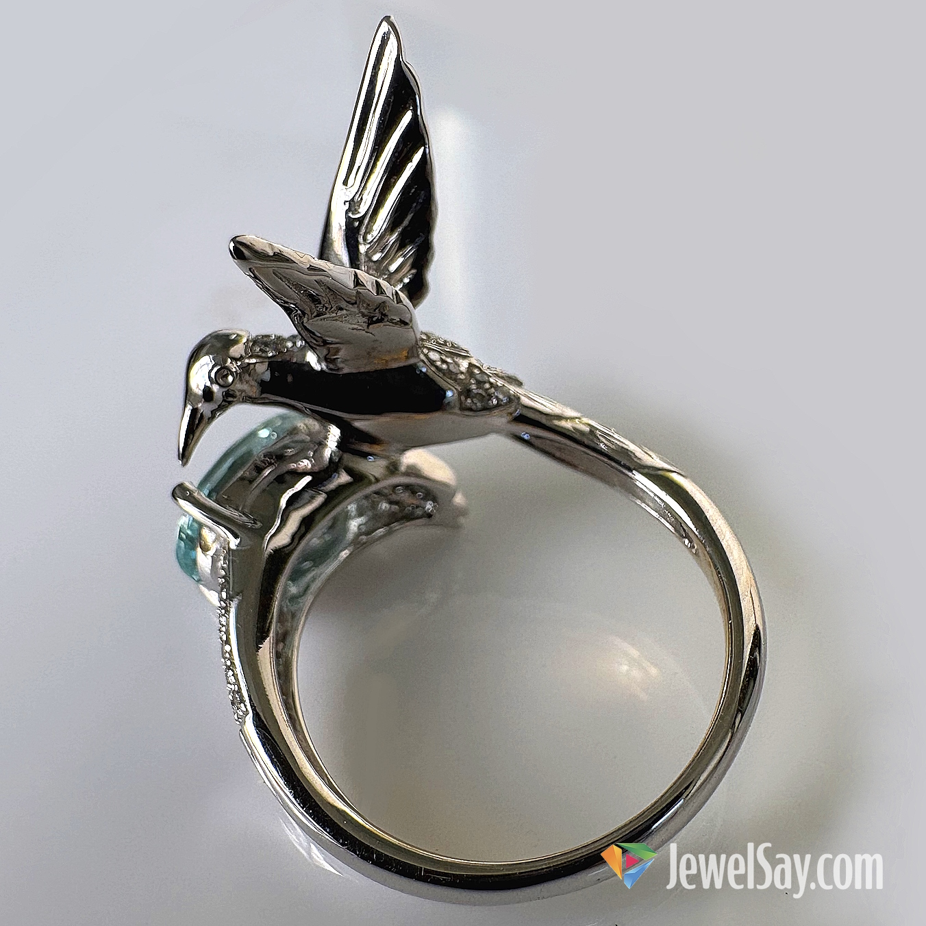 Exclusive handcrafted gold Hummingbird ring with a natural aquamarine and diamonds Exclusive handcrafted gold Hummingbird ring with a natural aquamarine and diamonds