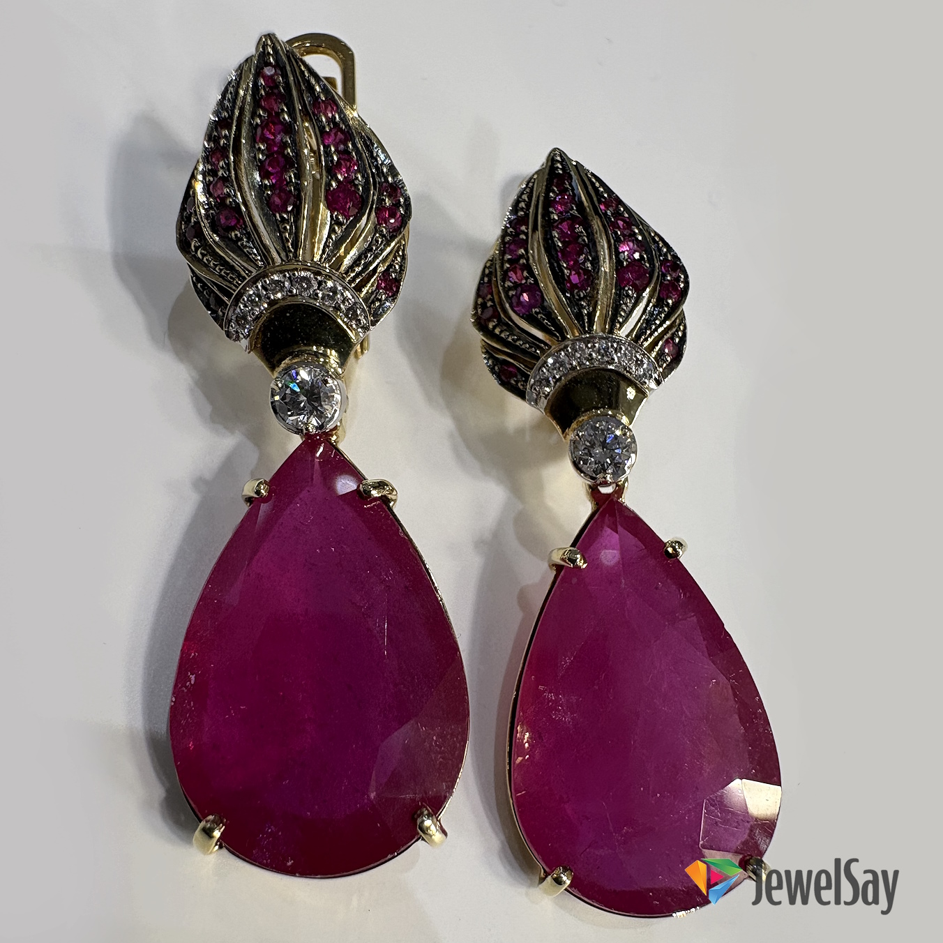 The jeweler will suggest diamonds, sapphires, or maybe alexandrites that change color under different lighting, so you can wear your earrings with confidence in any setting The jeweler will suggest diamonds, sapphires, or maybe alexandrites that change color under different lighting, so you can wear your earrings with confidence in any setting